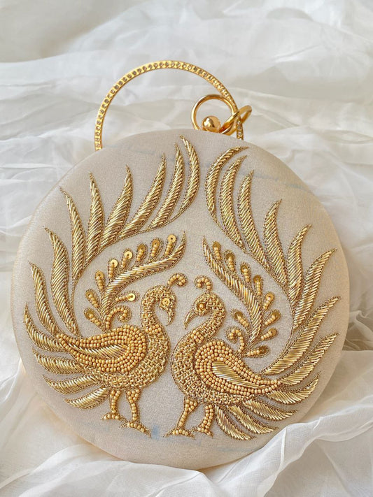 Mayurah cream clutch