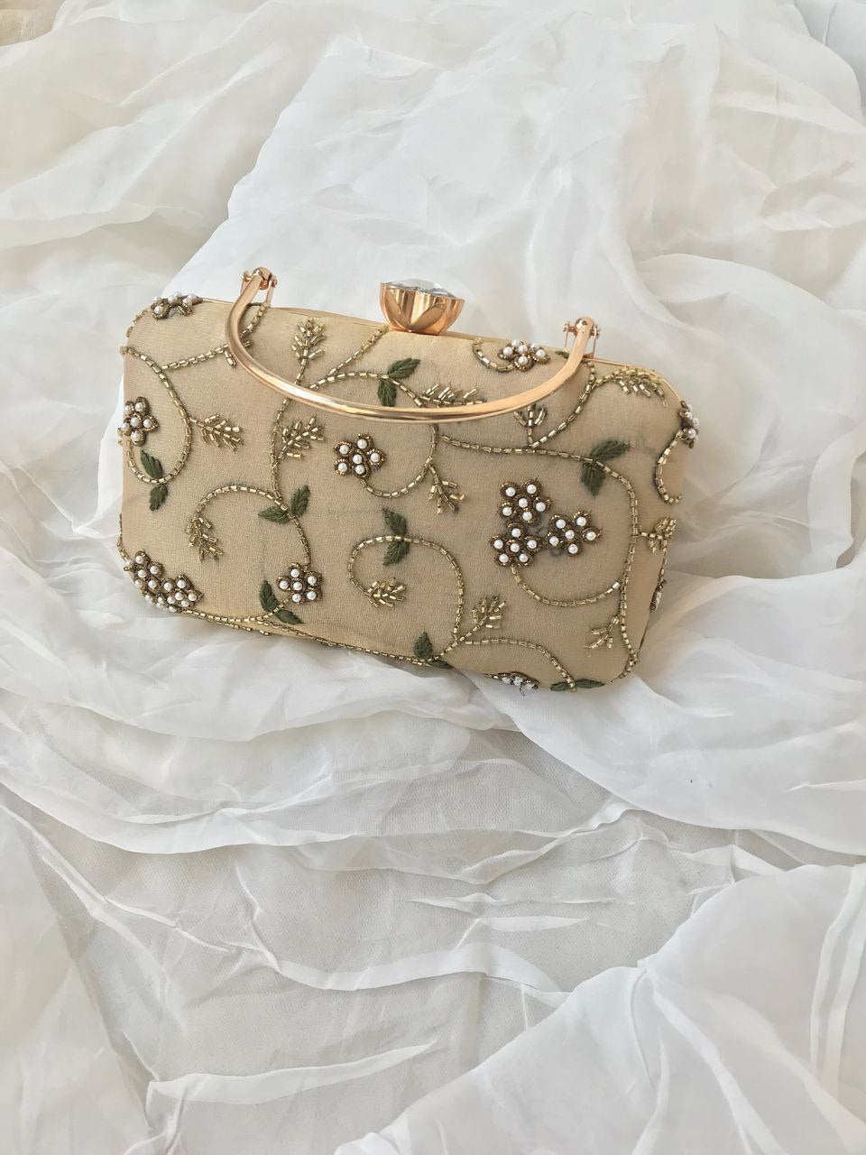 Cream floral clutch