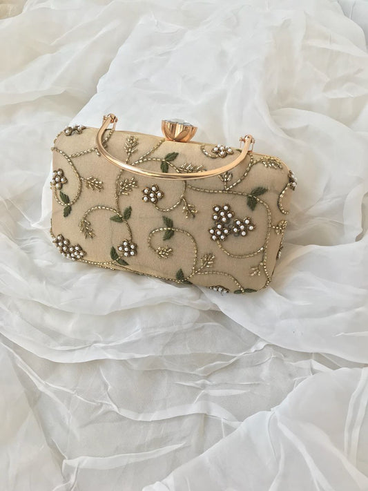 Cream floral clutch