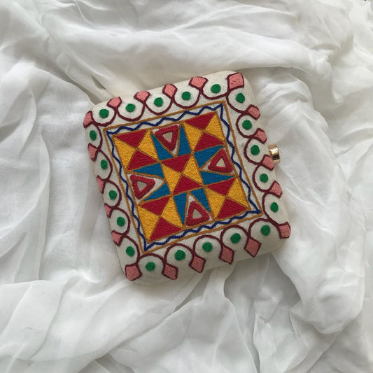 Cream Multi-colour clutch